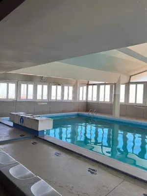 Piscine de l'établissement Chambre Privée Dans Appartement Vue Imprenable sur la Tour Eiffel ou située à proximité