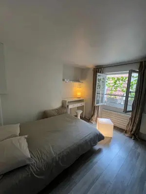 Un ou plusieurs lits dans un hébergement de l'établissement Studio en plein cœur de Paris