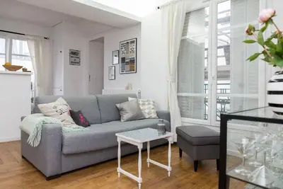 Coin salon dans l'établissement Beautiful Apt in Heart of Paris 2nd