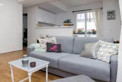 Coin salon dans l'établissement Beautiful Apt in Heart of Paris 2nd