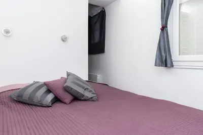 Un ou plusieurs lits dans un hébergement de l'établissement Beautiful Apt in Heart of Paris 2nd