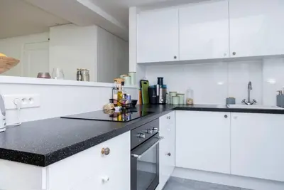 Cuisine ou kitchenette dans l'établissement Beautiful Apt in Heart of Paris 2nd