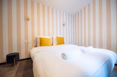 Un ou plusieurs lits dans un hébergement de l'établissement CIA - Triplex in Paris 17th