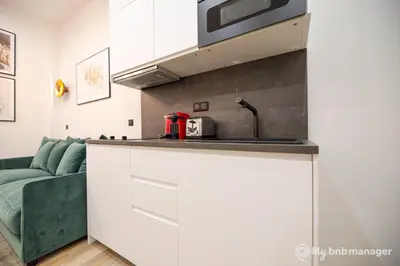 Cuisine ou kitchenette dans l'établissement CIA - Flat on rue La Fayette