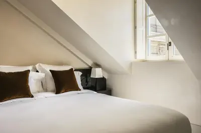Un ou plusieurs lits dans un hébergement de l'établissement Mondovi Luxury Suites