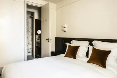 Un ou plusieurs lits dans un hébergement de l'établissement Mondovi Luxury Suites