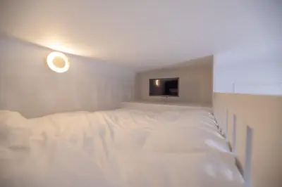 Un ou plusieurs lits dans un hébergement de l'établissement CIA - Mezzanine Studio by Arc de Triomphe
