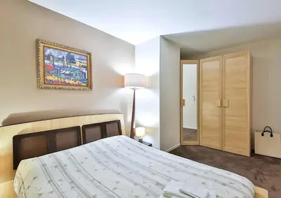 Un ou plusieurs lits dans un hébergement de l'établissement L'appartement Thibaud