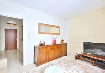 Télévision ou salle de divertissement dans l'établissement L'appartement Thibaud