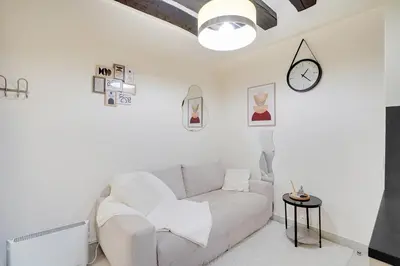 Coin salon dans l'établissement Le Marais charmant