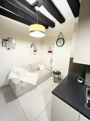 Coin salon dans l'établissement Le Marais charmant