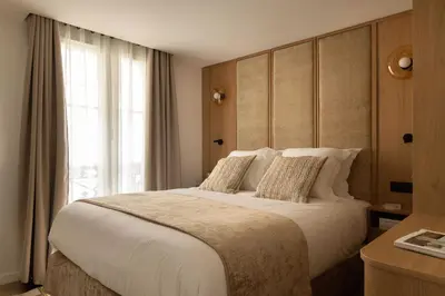 Un ou plusieurs lits dans un hébergement de l'établissement Elegant flat - 3BR-8P- Canal Saint-Martin