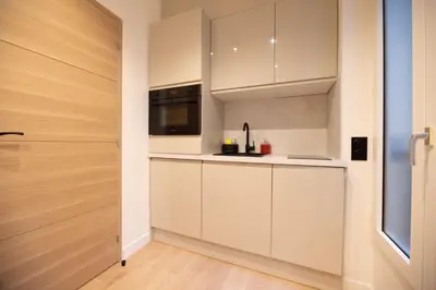 Cuisine ou kitchenette dans l'établissement CIA - Rue de l'Étoile Haven, 4P