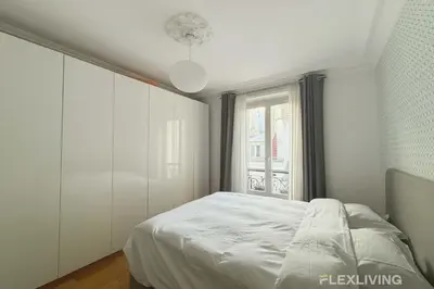 Un ou plusieurs lits dans un hébergement de l'établissement Flexliving - Whole flat - Crozatier