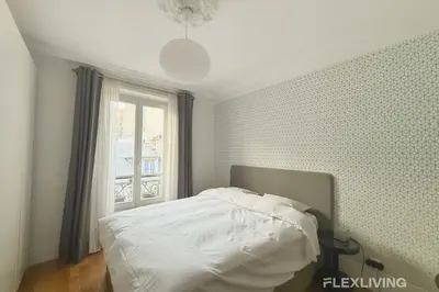 Un ou plusieurs lits dans un hébergement de l'établissement Flexliving - Whole flat - Crozatier