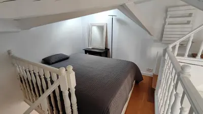 Un ou plusieurs lits dans un hébergement de l'établissement Paris 17 Apartment Near Arc de Triomphe