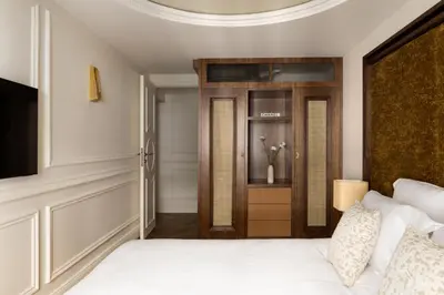 Un ou plusieurs lits dans un hébergement de l'établissement HIGHSTAY - Luxury Serviced Apartments - Victoires
