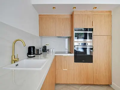 Cuisine ou kitchenette dans l'établissement Sublim Apartement Center of Paris Montmartre