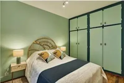 Un ou plusieurs lits dans un hébergement de l'établissement Superb Apartment Le Marais Place des Vosges