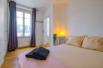 Un ou plusieurs lits dans un hébergement de l'établissement Cosy Apt 6 Guests for Family