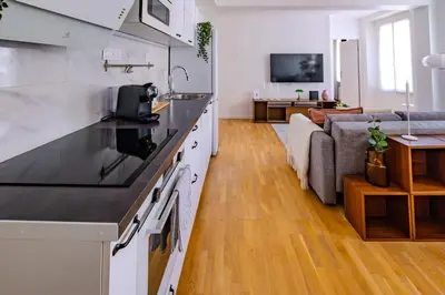 Cuisine ou kitchenette dans l'établissement Cosy Apt 6 Guests for Family