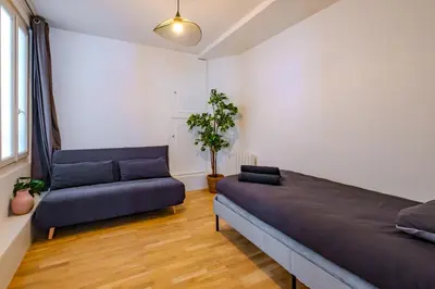 Coin salon dans l'établissement Cosy Apt 6 Guests for Family