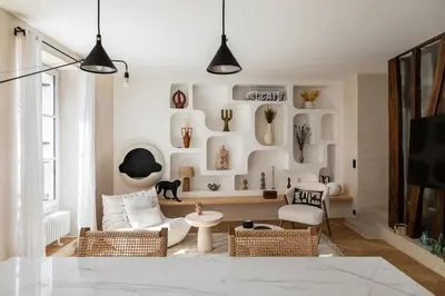 Coin salon dans l'établissement Amazing flat in an amazing Montmartre street