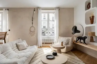 Coin salon dans l'établissement Amazing flat in an amazing Montmartre street