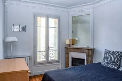 Un ou plusieurs lits dans un hébergement de l'établissement Oberkampf