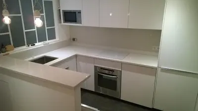 Cuisine ou kitchenette dans l'établissement Batignolles chic 75 m2