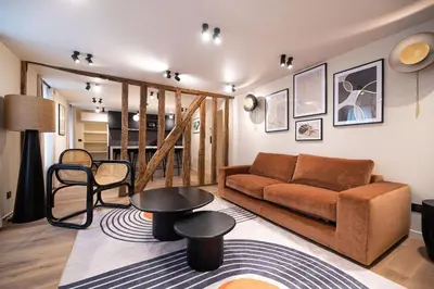 Coin salon dans l'établissement CIA - Home on Grands Boulevards