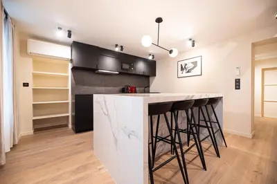 Cuisine ou kitchenette dans l'établissement CIA - Home on Grands Boulevards