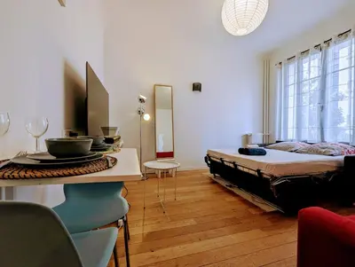 Un ou plusieurs lits dans un hébergement de l'établissement Chic and comfortable studio near Paris