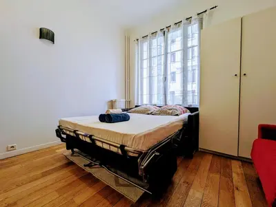 Un ou plusieurs lits dans un hébergement de l'établissement Chic and comfortable studio near Paris