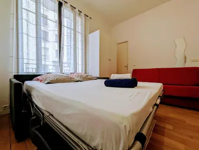 Un ou plusieurs lits dans un hébergement de l'établissement Chic and comfortable studio near Paris