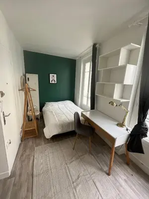 Un ou plusieurs lits dans un hébergement de l'établissement Flexliving - studio - Boulangers
