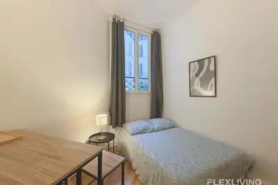 Un ou plusieurs lits dans un hébergement de l'établissement Nice Studio Design - Between Montmartre & Opéra Garnier