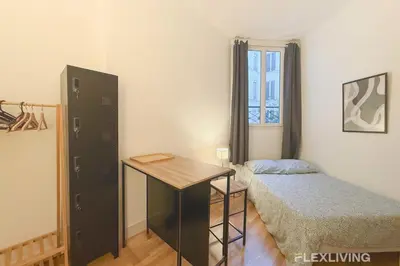 Un ou plusieurs lits dans un hébergement de l'établissement Nice Studio Design - Between Montmartre & Opéra Garnier