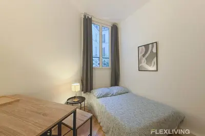 Un ou plusieurs lits dans un hébergement de l'établissement Nice Studio Design - Between Montmartre & Opéra Garnier