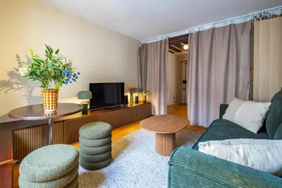 Télévision ou salle de divertissement dans l'établissement Apt Central Hotel de Ville
