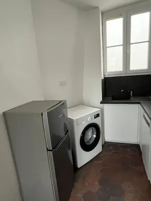 Cuisine ou kitchenette dans l'établissement Mouffetard 3 rooms