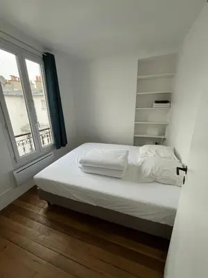 Un ou plusieurs lits dans un hébergement de l'établissement Mouffetard 3 rooms