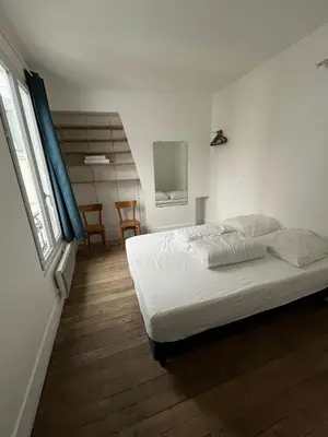 Un ou plusieurs lits dans un hébergement de l'établissement Mouffetard 3 rooms