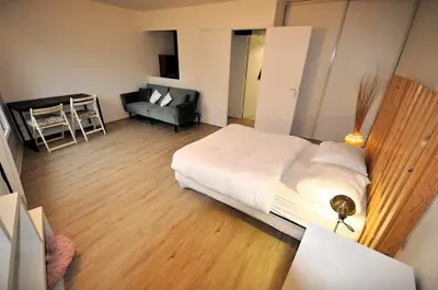 Un ou plusieurs lits dans un hébergement de l'établissement Nice 36 m2 - Parc des Buttes Chaumont!
