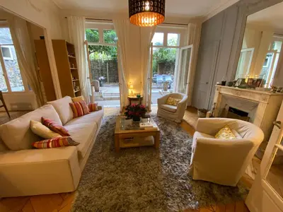 Coin salon dans l'établissement Magnifique appartement avec terrasse à côté de la Tour Eiffel