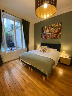 Un ou plusieurs lits dans un hébergement de l'établissement Magnifique appartement avec terrasse à côté de la Tour Eiffel