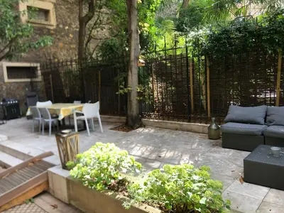 Coin salon dans l'établissement Magnifique appartement avec terrasse à côté de la Tour Eiffel