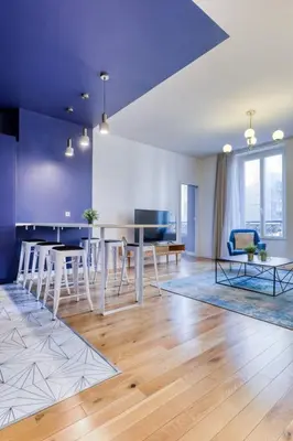 Coin salon dans l'établissement Blue Design 2BDR Flat in the Heart of Bastille