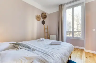Un ou plusieurs lits dans un hébergement de l'établissement Blue Design 2BDR Flat in the Heart of Bastille