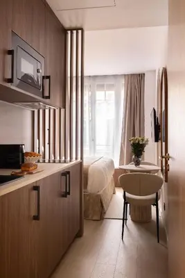 Cuisine ou kitchenette dans l'établissement Charming Studio climatisé - 2P- Madeleine